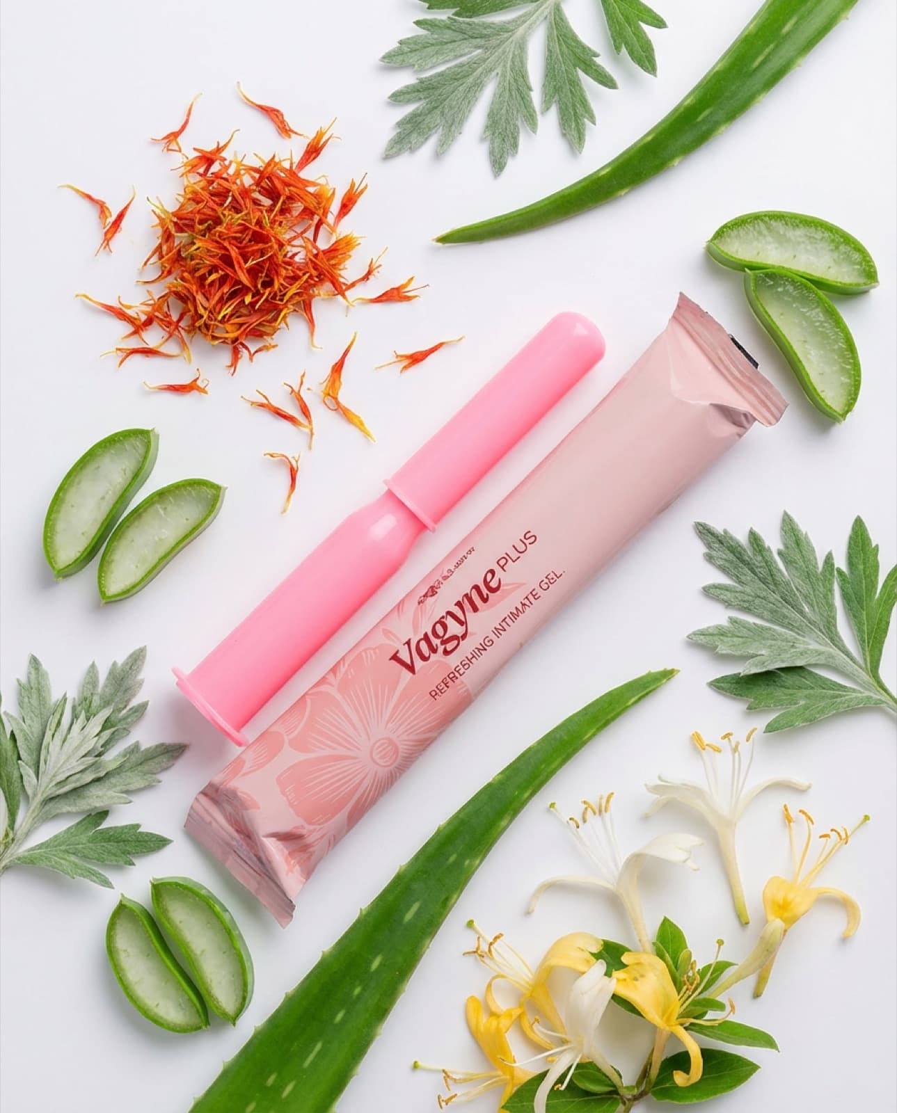 VagynePlus Refreshing Intimate Gel applicator surrounded by fresh botanical ingredients
